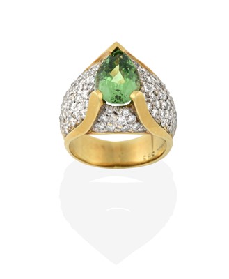 Lot 2331 - A Tsavorite Garnet and Diamond Ring, by Aletto...