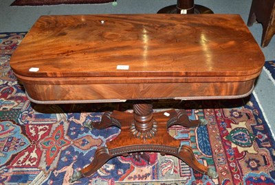 Lot 448 - A mahogany card table with platform base