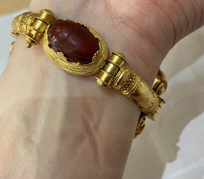 Lot 2396 - An Archaeological Revival Style Scarab Bangle,...
