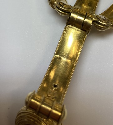 Lot 2396 - An Archaeological Revival Style Scarab Bangle,...