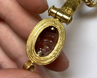 Lot 2396 - An Archaeological Revival Style Scarab Bangle,...