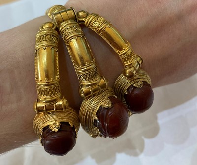 Lot 2396 - An Archaeological Revival Style Scarab Bangle,...