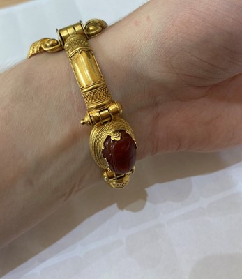 Lot 2396 - An Archaeological Revival Style Scarab Bangle,...