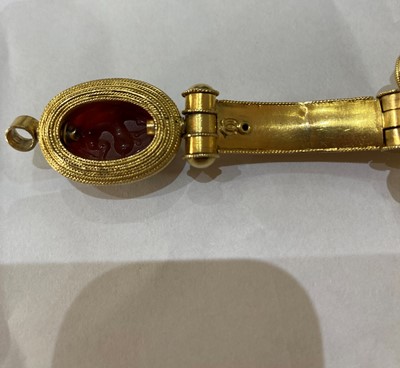 Lot 2396 - An Archaeological Revival Style Scarab Bangle,...