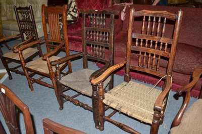 Lot 462 - Four rush seated armchairs