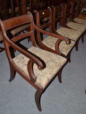 Lot 463 - Six Georgian sabre leg dining chairs (one with broken leg) and an elm ladder back armchair