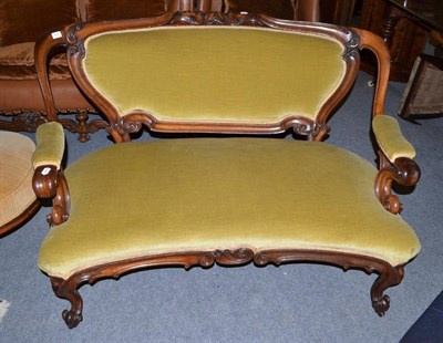 Lot 467 - A Victorian mahogany open frame sofa with velvet upholstery