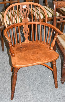 Lot 510 - A yew wood Windsor armchair with crinoline...