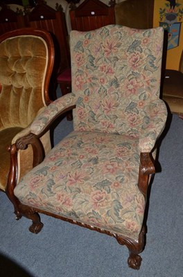 Lot 474 - A 19th century mahogany armchair with ball and claw feet