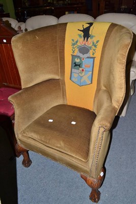 Lot 479 - Georgian style wing back chair with Armorial shield