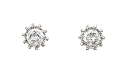 Lot 2302 - A Pair of Diamond Solitaire Earrings the round...