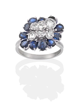 Lot 2413 - A Sapphire and Diamond Cluster Ring