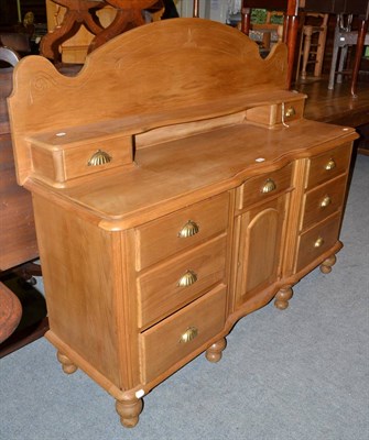 Lot 505 - Pine sideboard with serpentine front