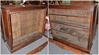 Lot 508 - A large walnut bookcase in two halves