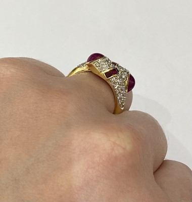 Lot 2390 - A Ruby and Diamond Twist Ring