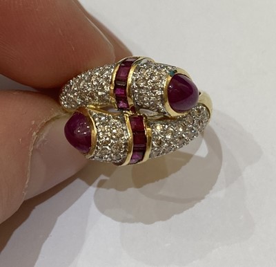 Lot 2390 - A Ruby and Diamond Twist Ring