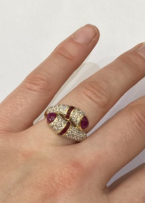 Lot 2390 - A Ruby and Diamond Twist Ring