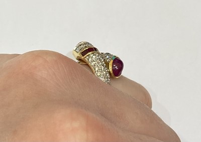 Lot 2390 - A Ruby and Diamond Twist Ring