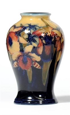 Lot 857 - A William Moorcroft Orchid Pattern Vase, circa 1930's, on a yellow to blue ground, impressed...