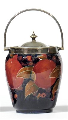 Lot 858 - A William Moorcroft Pomegranate Pattern Biscuit Barrel, circa 1920's, impressed factory marks...