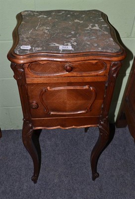 Lot 523 - A 19th century French Kingwood bedside cupboard with rouge marble top