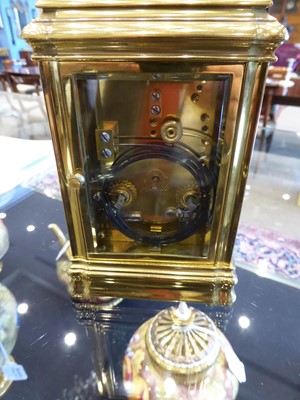 Lot 127 - A Gilt Brass and Porcelain Mounted Striking...