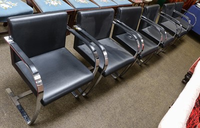 Lot 1233 - A Set of Six Black Leather and Chromed...