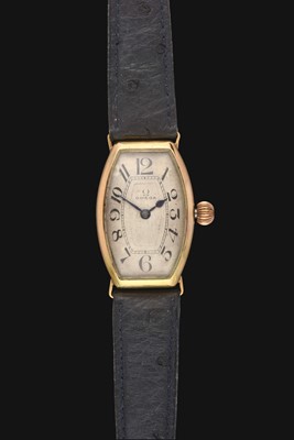 Lot 2095 - Omega: A Rare Tonneau Shaped 14 Carat Gold Wristwatch