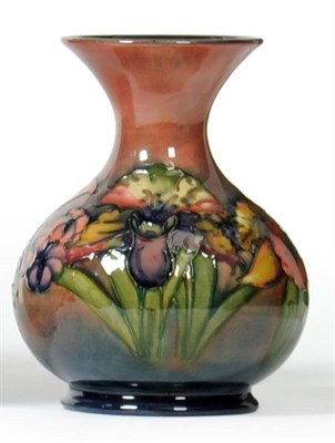 Lot 860 - A Walter Moorcroft Flambé Orchid and Spring Flowers Pattern Vase, impressed factory marks and blue