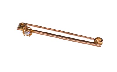 Lot 47 - A diamond bar brooch, length 4.6cm