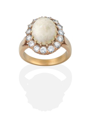 Lot 2343 - An Opal and Diamond Cluster Ring
