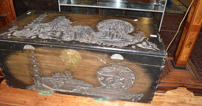 Lot 574 - Carved camphor wood chest and an inlaid standard lamp and shade on square base