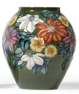 Lot 863 - A Modern Moorcroft Royal Tribute Pattern Trial Vase, designed by Rachel Bishop, on a green...