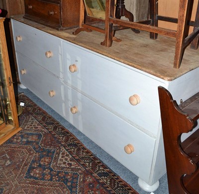 Lot 590 - Cream painted four drawer dresser base with an oak top