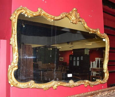 Lot 592 - A gilt metal framed mirror