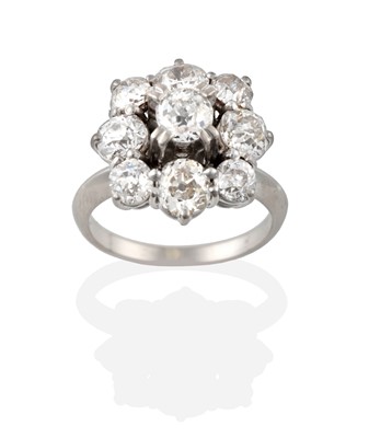 Lot 2269 - A Diamond Cluster Ring, the central raised old...