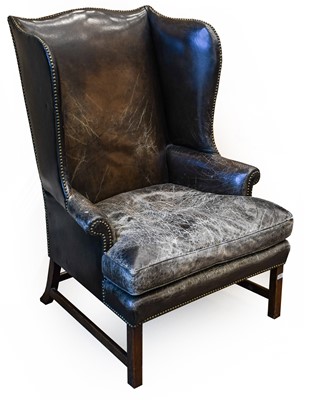 Lot 293 - A George III Style Wing Back Armchair, late...