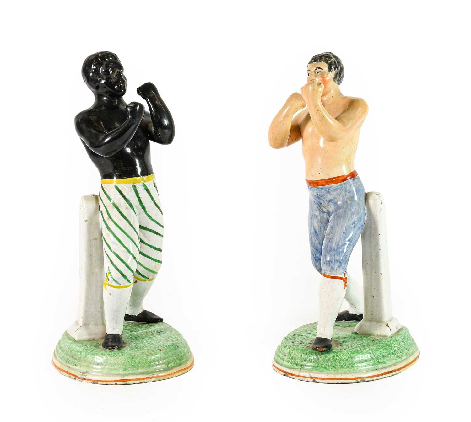 Lot 61 - A Pair of Staffordshire Pottery Figures of Tom...