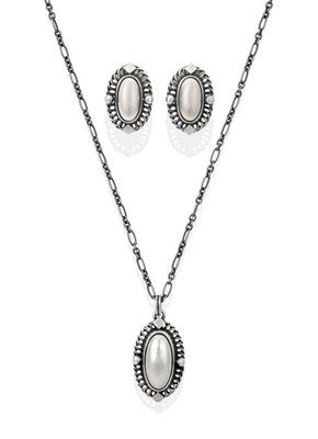 Lot 2251 - A Pendant on Chain and A Pair Of Matching Earrings