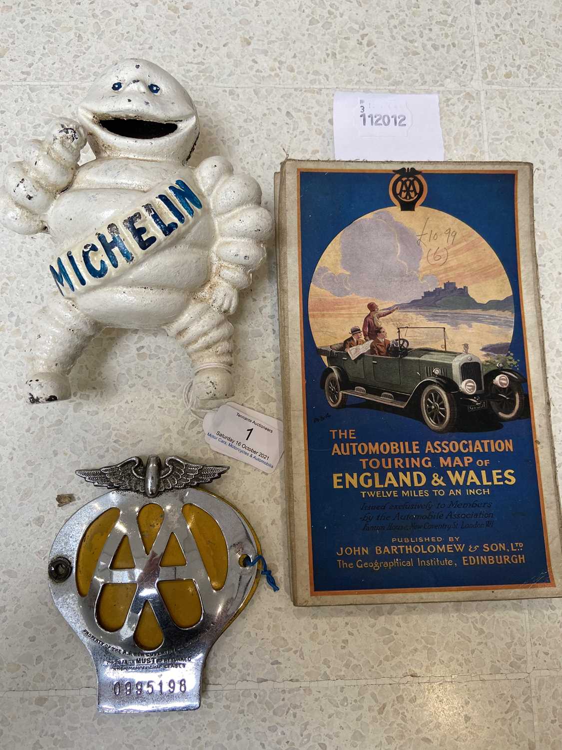 Lot 1 - Michelin cast metal money box, AA badge and...