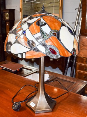 Lot 319 - A Tiffany style table lamp, the shade...