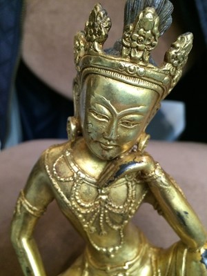 Lot 151 - A Sino-Tibetan gilt bronze figure of a...
