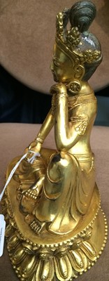 Lot 151 - A Sino-Tibetan gilt bronze figure of a...