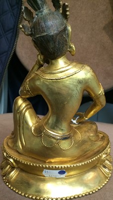 Lot 99 - A Sino-Tibetan Gilt Bronze Figure of a...