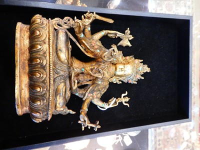 Lot 690 - A Sino-Tibetan Gilt Bronze Figure of a...