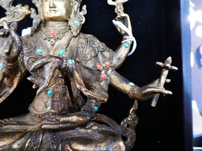 Lot 14 - A Sino-Tibetan Gilt Bronze Figure of a...