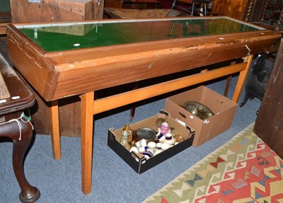 Lot 634 - A shop table-top display counter with a glazed top and two drawers