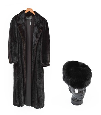 Lot 2090 - Hertzberg Furs Dark Brown Mink Long Coat and a...