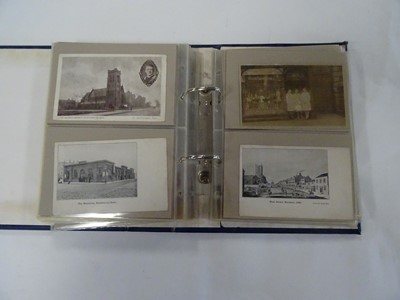 Lot 366 - A blue album containing approx. 100 postcards...