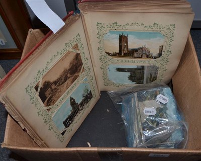 Lot 664 - Four albums of postcards and a quantity of loose cards